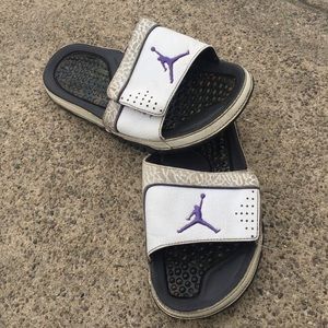 purple jordan flip flops